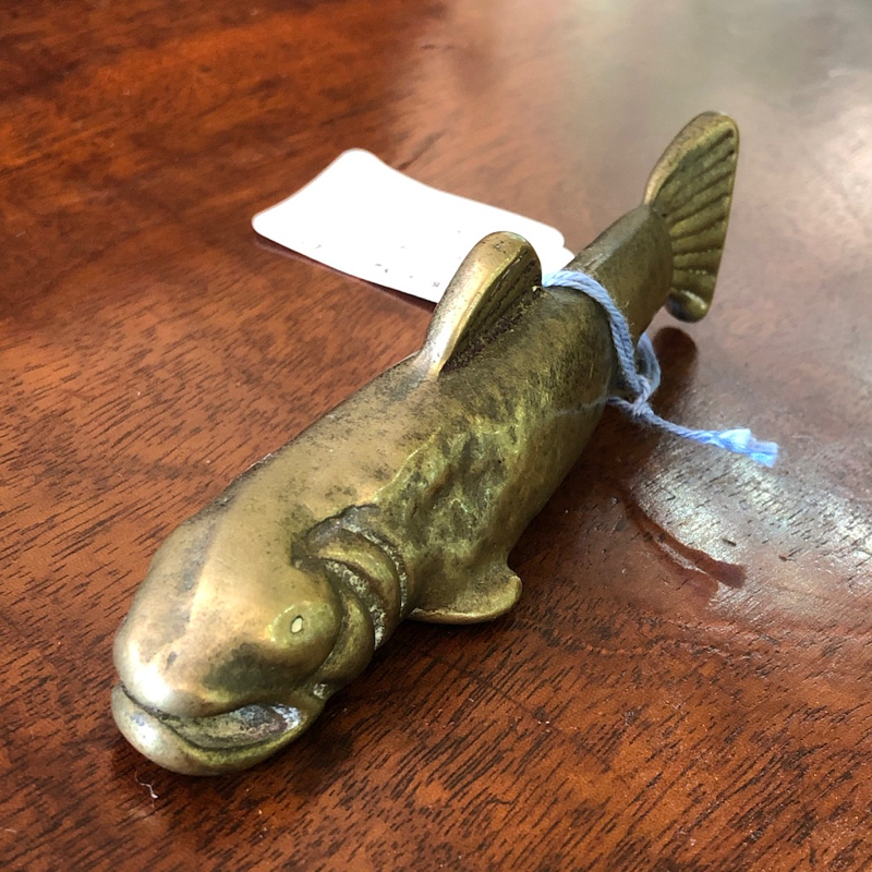 Brass paperweight - a fish swimming.